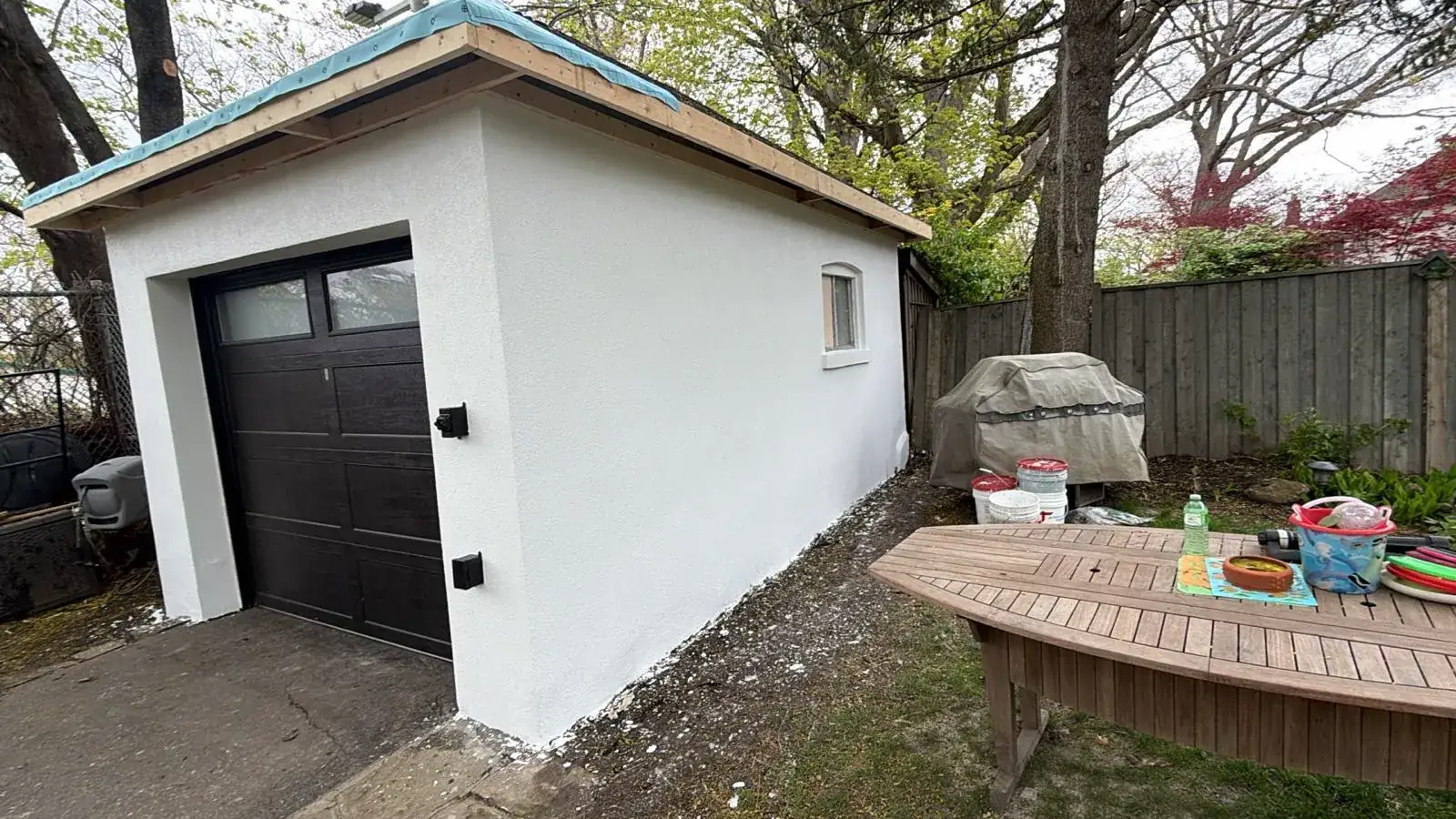 Finished garage side wall in white finish