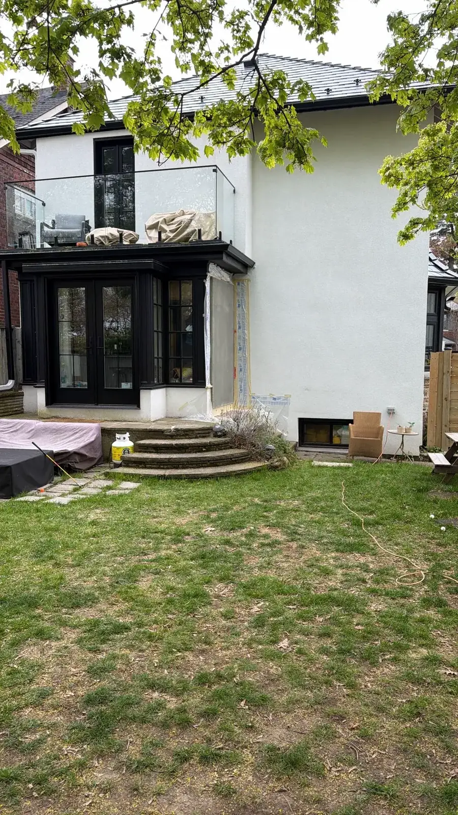 House wall section patched and prepped, transitions feathered into the existing facade
