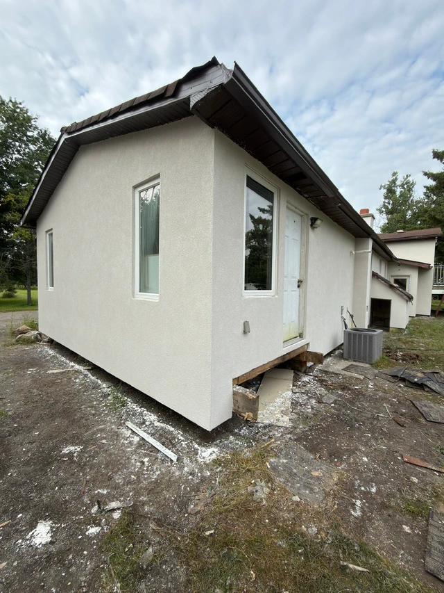 Completed EIFS exterior wall on a FAIME bungalow project in Innisfil