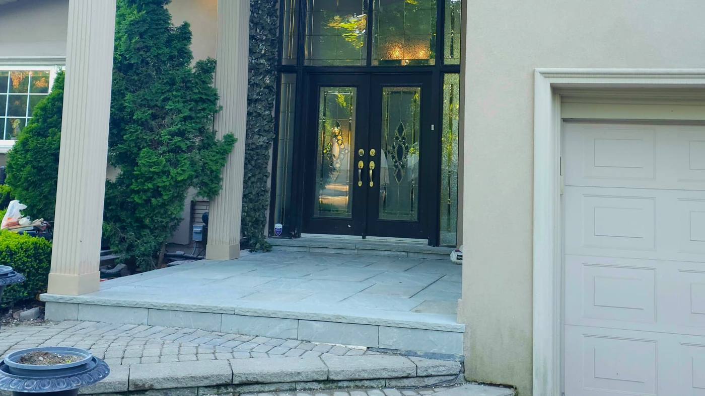 Exterior entrance after moulding and paint — GTA residential