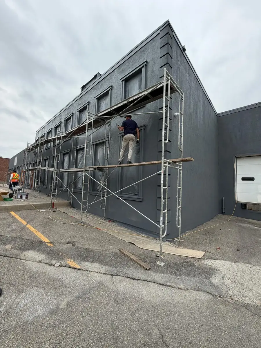 Scaffolding set along the full elevation of the commercial building