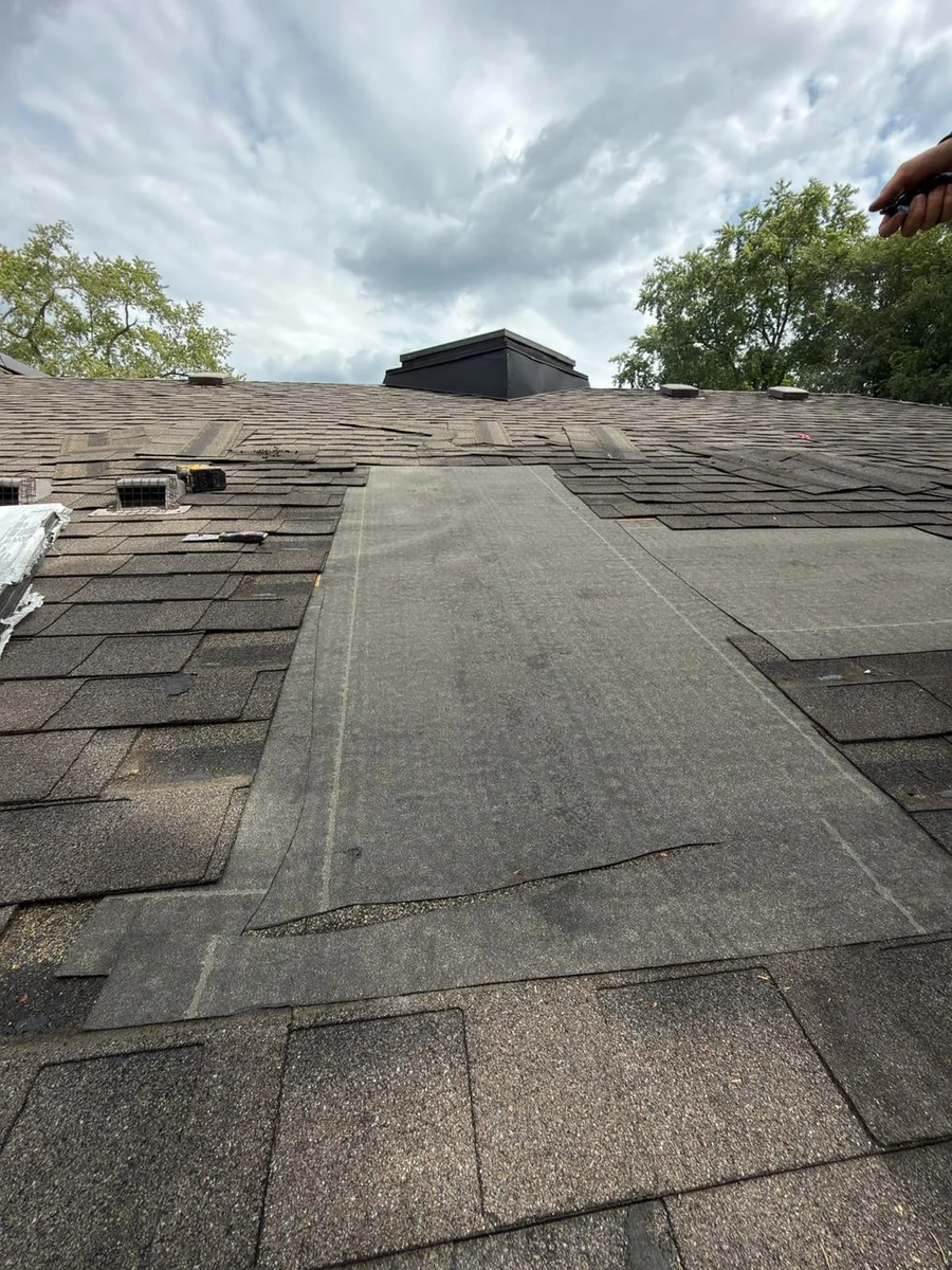 The same Willowdale roof slope after repair, the opened area sealed and covered with self-adhering membrane underlayment running up to the ridge