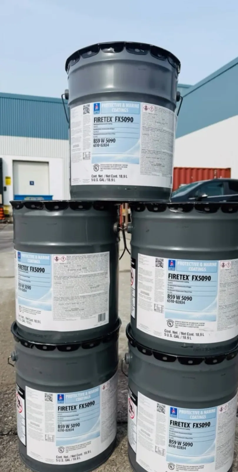 Pails of Sherwin-Williams Firetex FX5090 intumescent coating on site